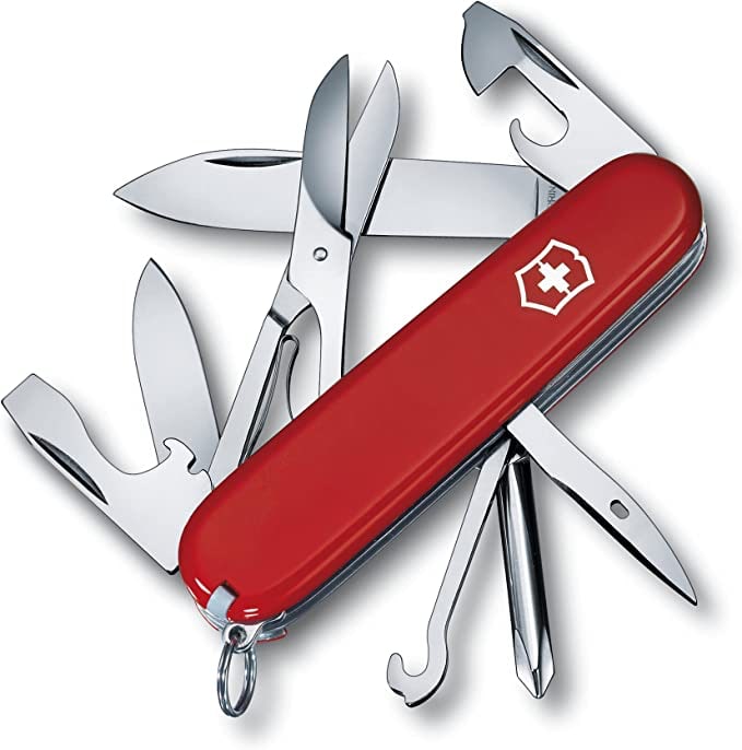 A Swiss Army Knife, with its can opener, knives, scissors, screwdriver, and other assorted tools exposed.